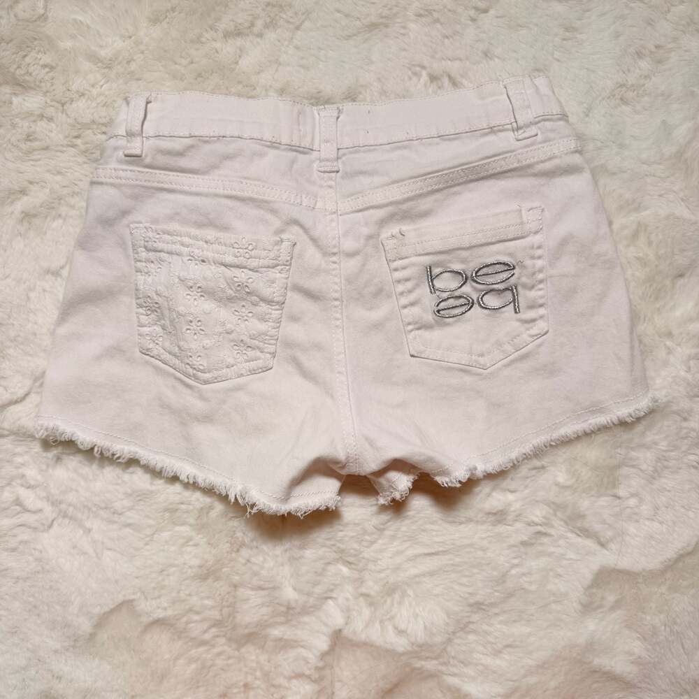 bebe white eyelet raw hem denim shorts